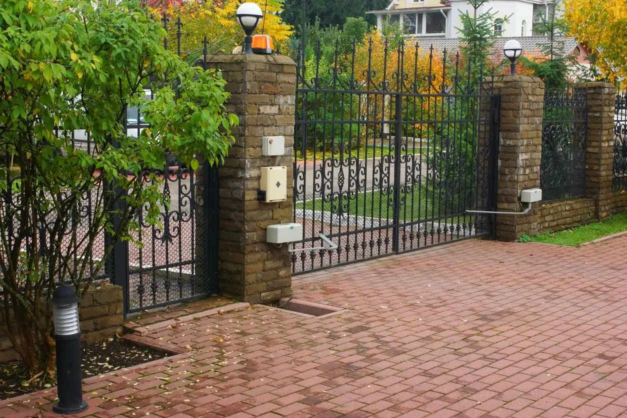 black iron fence with gate